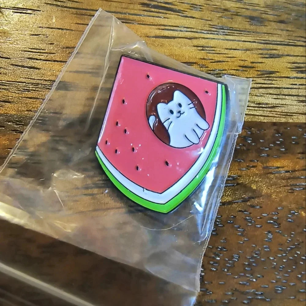 White cartoon cat in pink green watermelon enamel pin backpack hat clothes bag